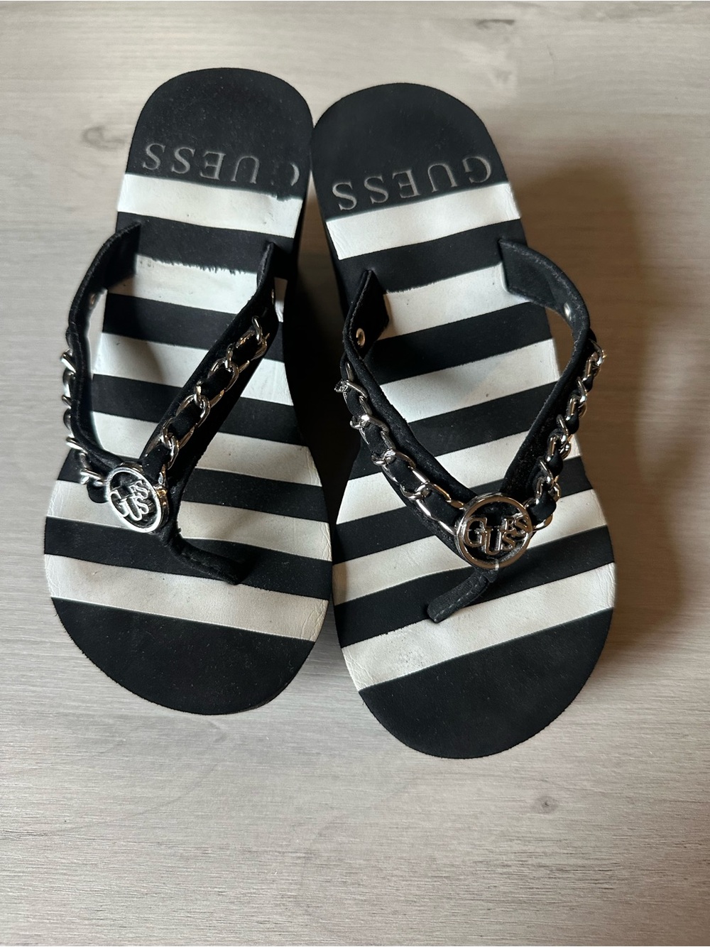 GUESS Black & White Striped Chain-Accent Flip Flops
